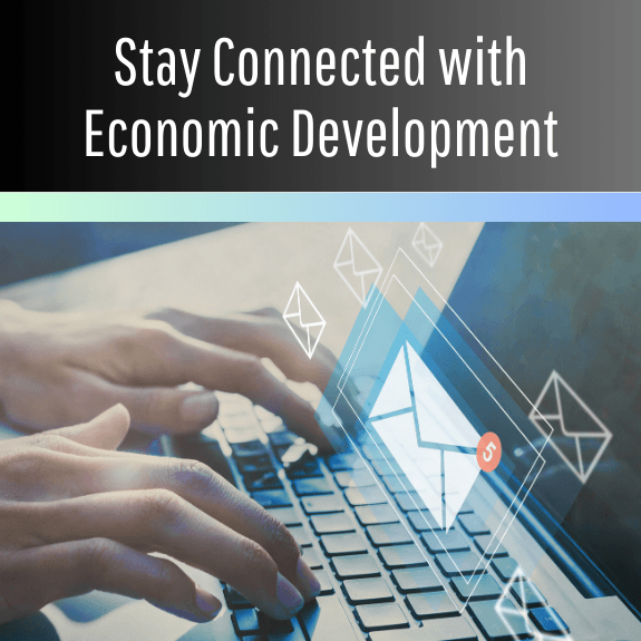 Hands typing on a keyboard