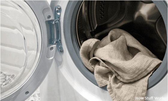 Heat Pump Dryer with door open and blanket inside 