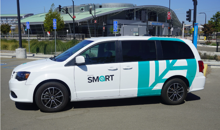 Smart shuttle parked inside parking lot
