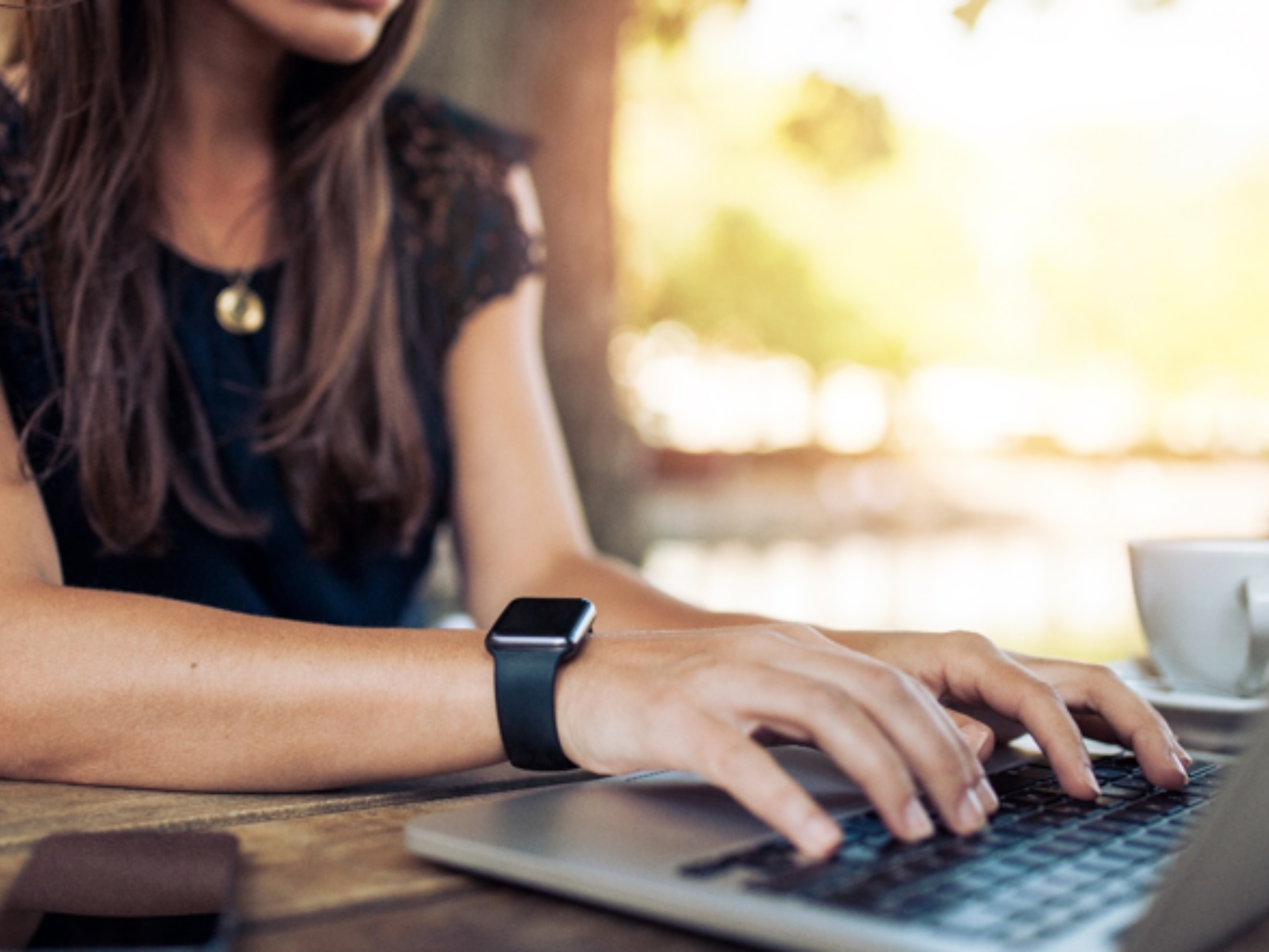Woman typing on the computer 