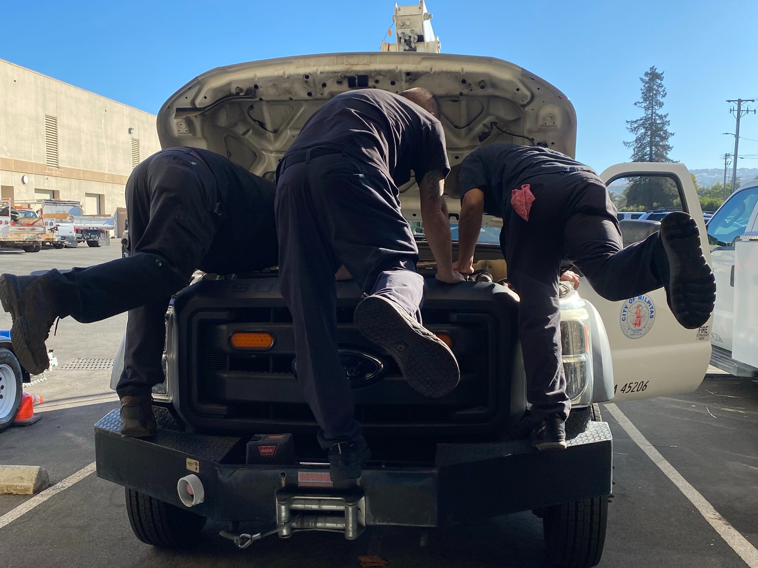 Fleet team fixing truck
