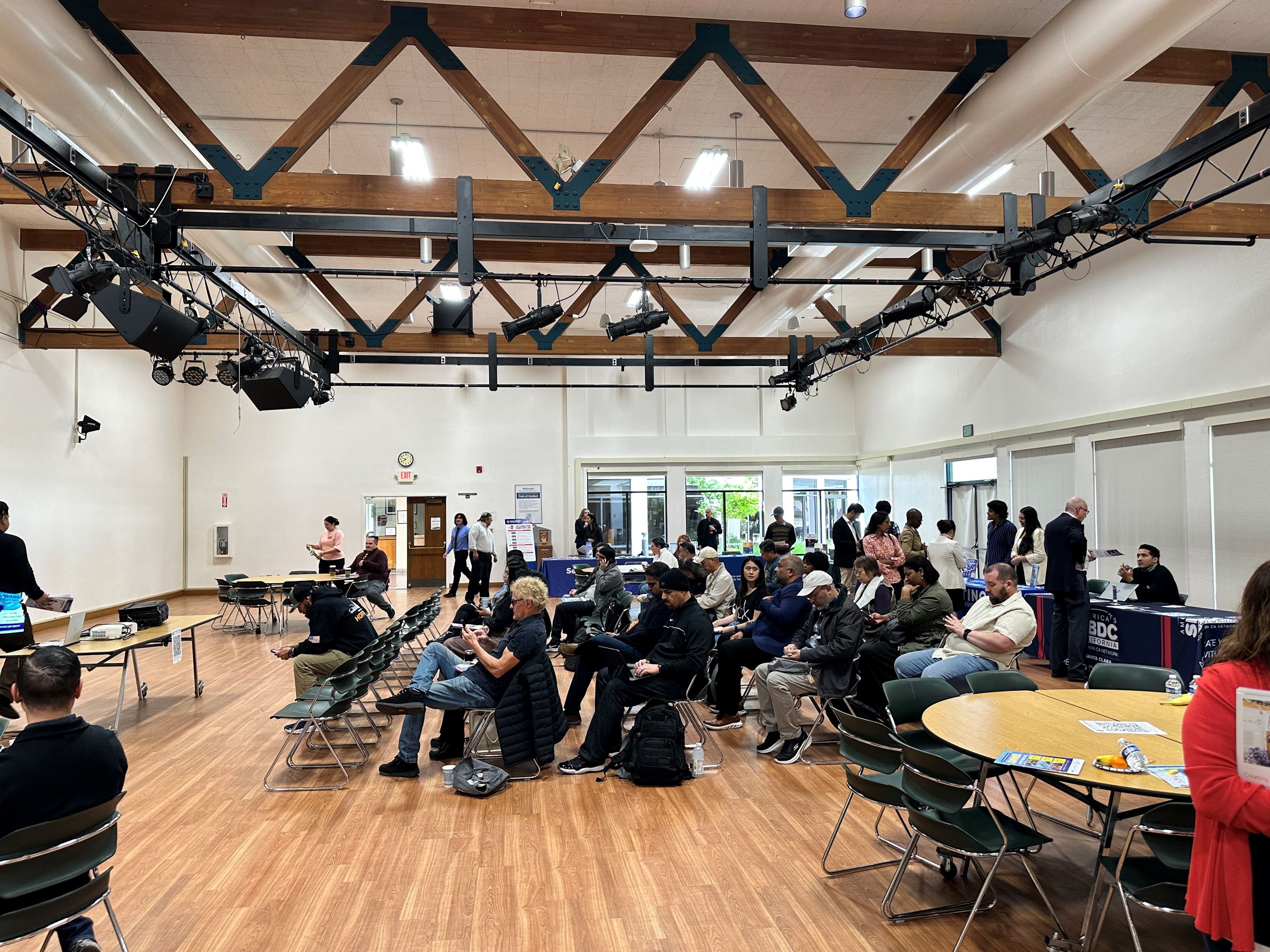 Room full of people sitting in a theater style arrangement