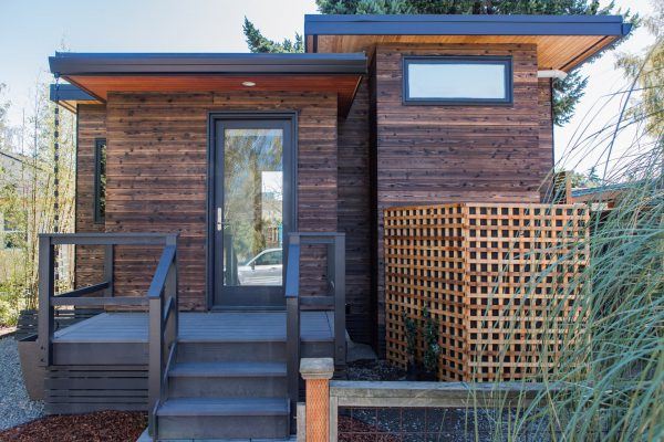 Wood Accessory Dwelling Unit (ADU) with front porch.